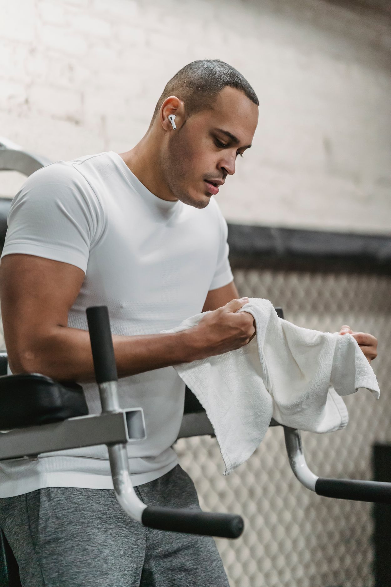 Athlete taking a break from exercise (editorial stock photography)