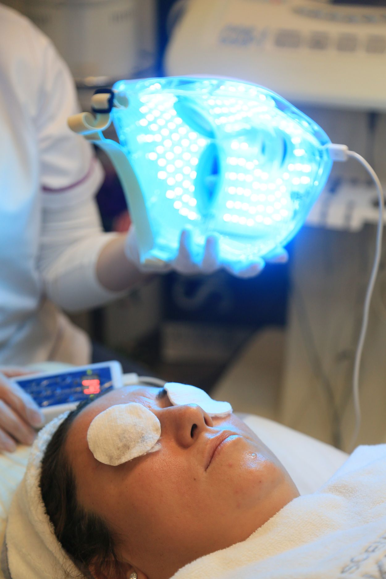 LED facial treatment in a spa (editorial stock photography)