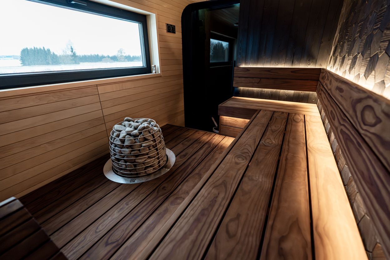 Warm modern wooden sauna interior (editorial stock photography)