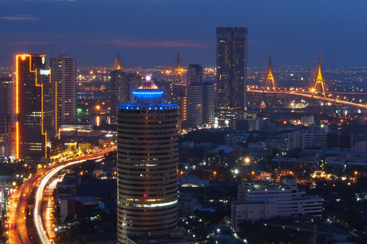 Bangkok skyline with illuminated buildings (editorial stock photography)